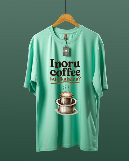 DUMM Inoru Coffee Kudikalama oversized t-shirt in mint green on wooden hanger