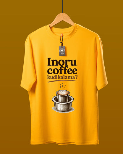 DUMM Inoru Coffee Kudikalama oversized t-shirt in mustard yellow on wooden hanger